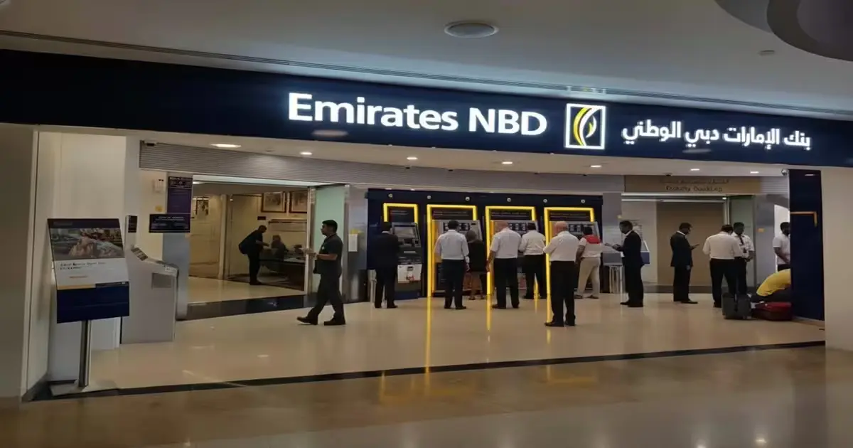 Foreigner completing bank account opening in Dubai branch